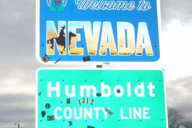 No, those are not bulletholes but could easily have been.